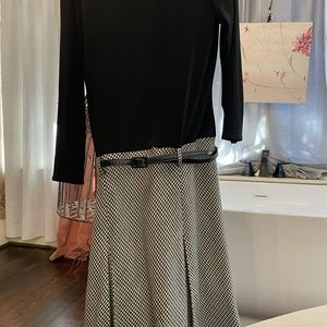 3/$15 fitted top with houndstooth skirt; from an exclusive local boutique